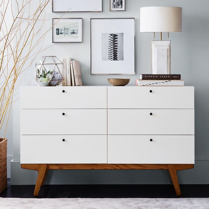 Storage space in modern chests of drawers and sideboards