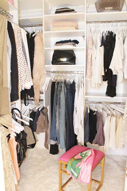Chic Walk In Closet with Pink Greek Key Stool - Transitional - Closet