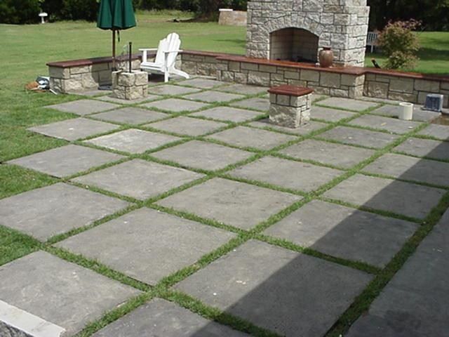 I like this idea of square concrete slabs for patio - might not be
