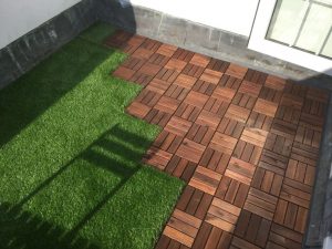 Roof terrace with ikea decking tiles and Oakham artificial grass 3