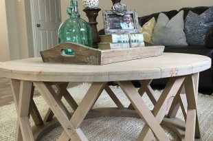 Gorgeous rustic round farmhouse coffee table by ModernRefinement