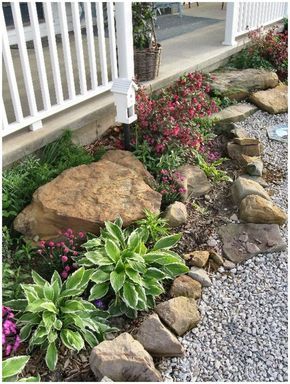 Rustic Flower Beds with Rocks in Front of House Ideas