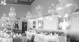 white balloon party decor---I like the table swag above and on the