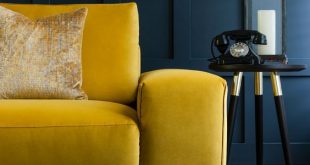 Luxury mustard yellow sofa perfect for dark moody living rooms
