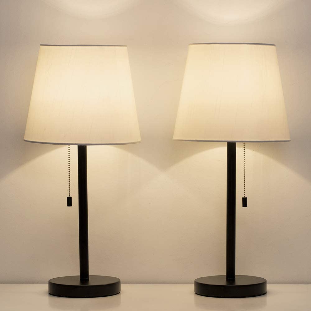 Bedside table with lamps