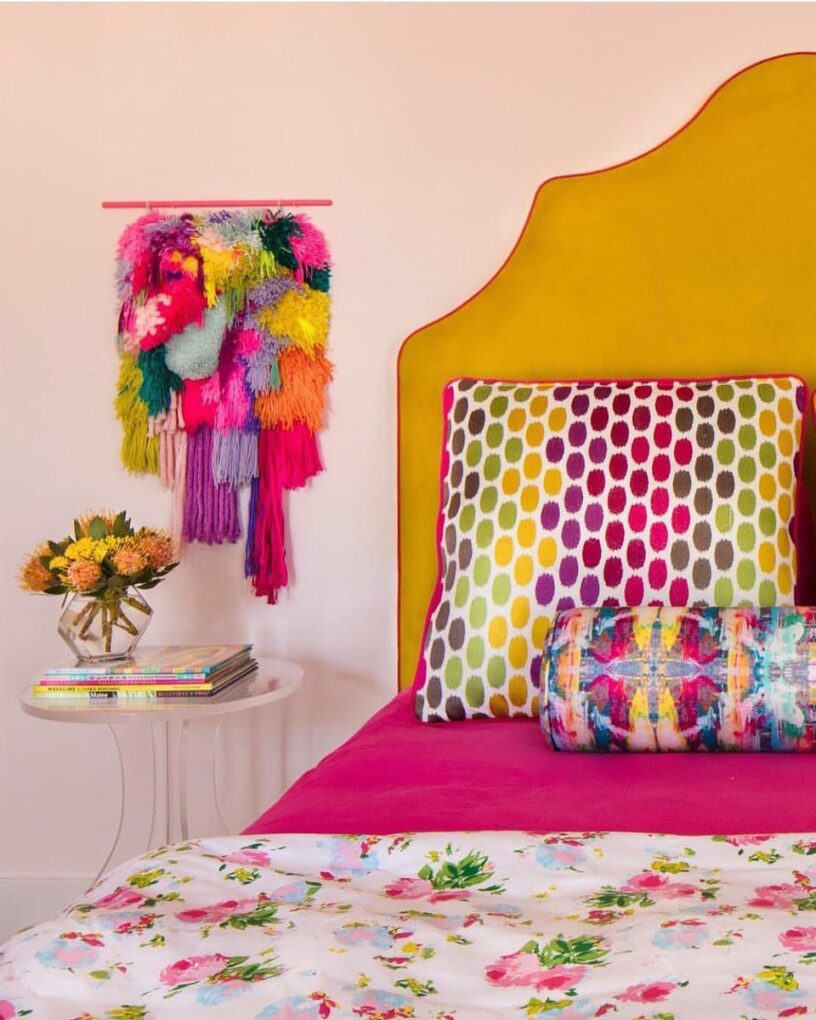Pompoms and cushions in bedroom