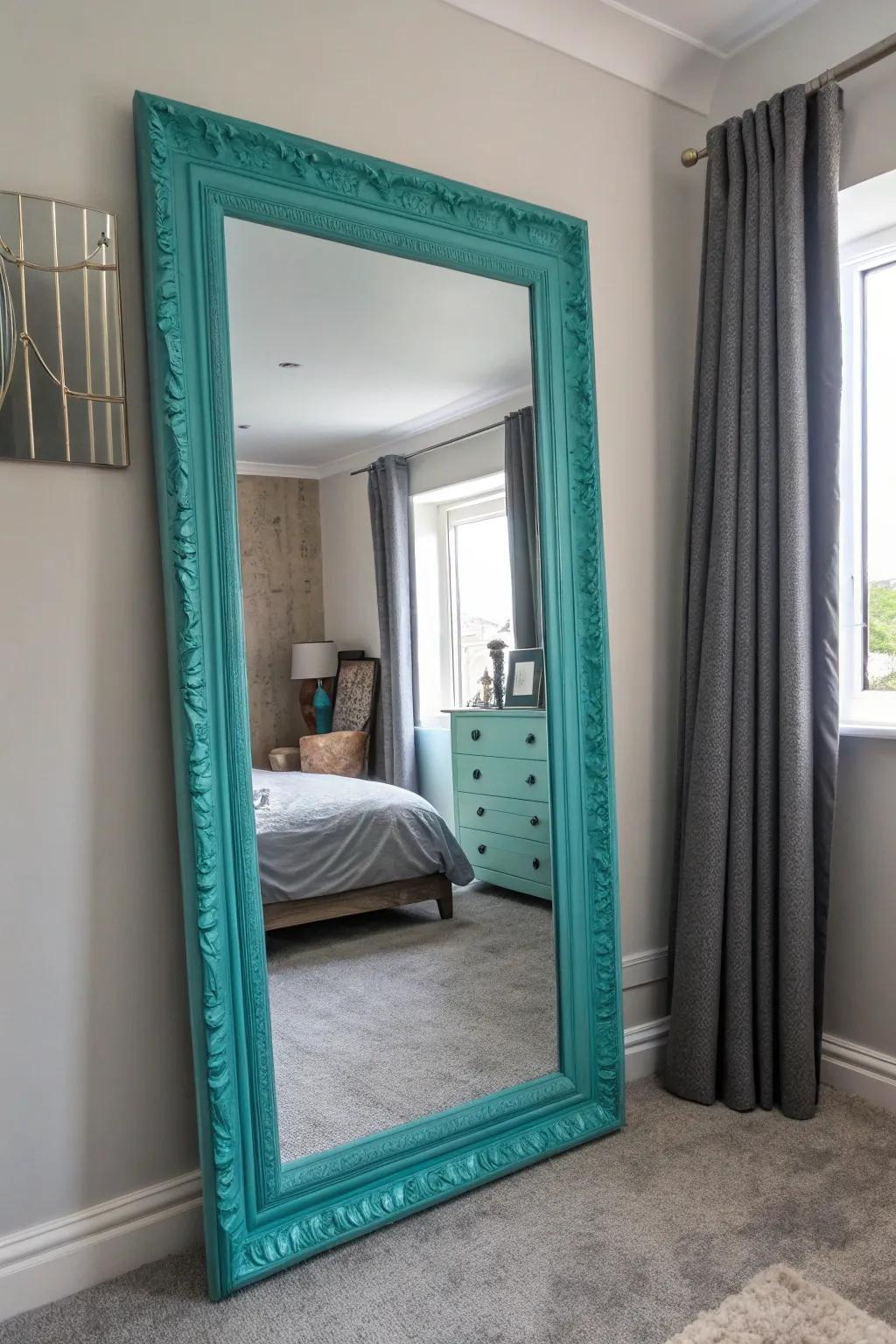 Turquoise-framed mirror enhancing bedroom space