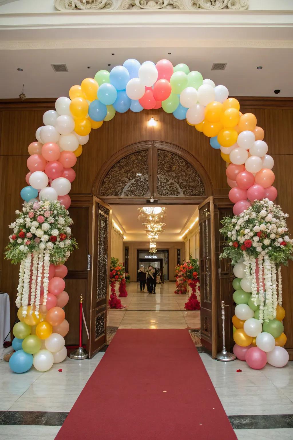 A beautifully decorated entrance welcomes guests to the birthday party.
