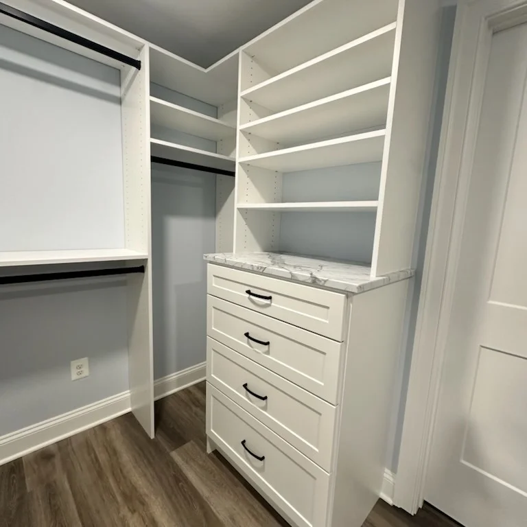 White corner basement closet