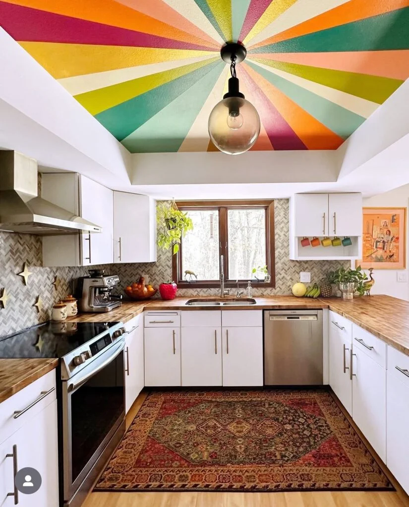 Rainbow sunburst painted ceiling in kitchen
