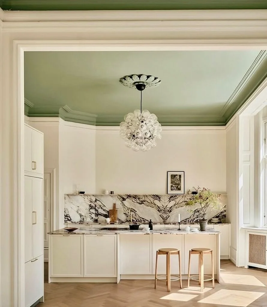 Sage green painted ceiling in kitchen